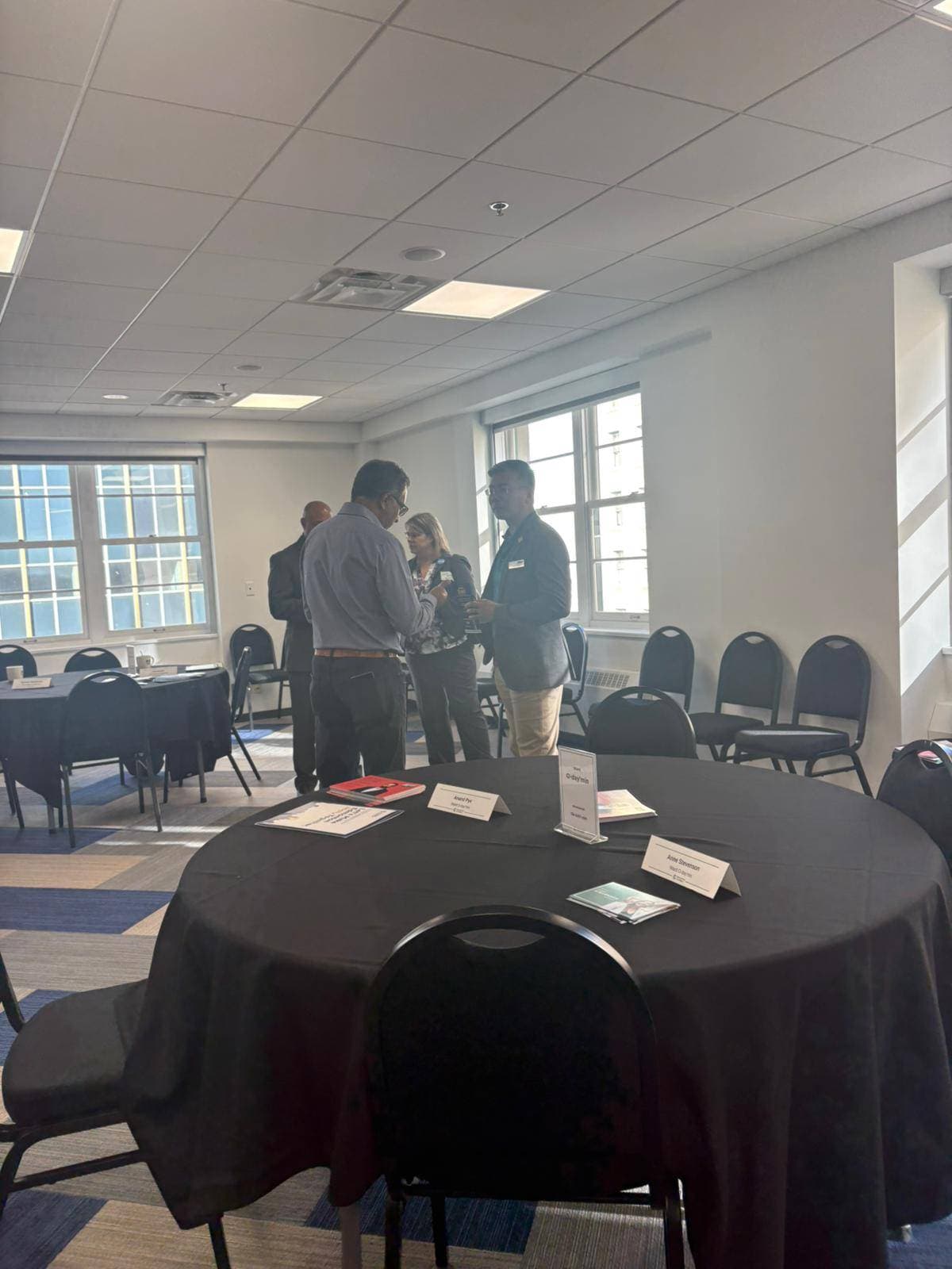 Ali in conversation with attendees at Chamber of Commerce Meet and Greet